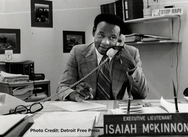 Photo of Dr. Ike McKinnon speaking on the phone at his desk